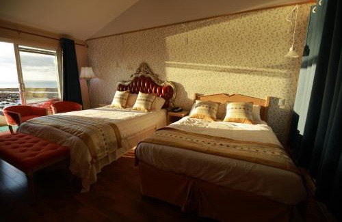 Isle aux Coudres Hôtel | Hotel La Roche Pleureuse