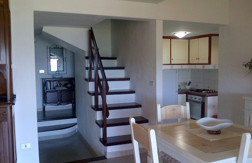 Porto Taverna Maison | house at 80 mt from the beach, with garden and terrace with a panoramic sea view