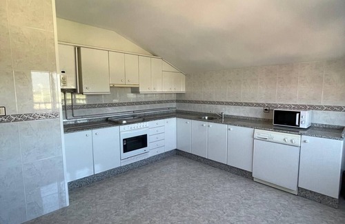 Carnota Chalet De Ski | House in the middle of Carnota Beach, considered one of the best in Europe.