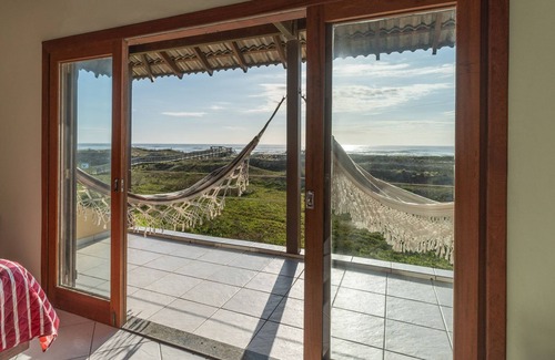 Barra de Ibiraquera Maison | maison sur la plage avec une vue spectaculaire et un grand jardin