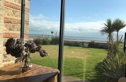 Quineville Maison | Maison sur la plage pieds dans l'eau, vue mer de toutes les pièces