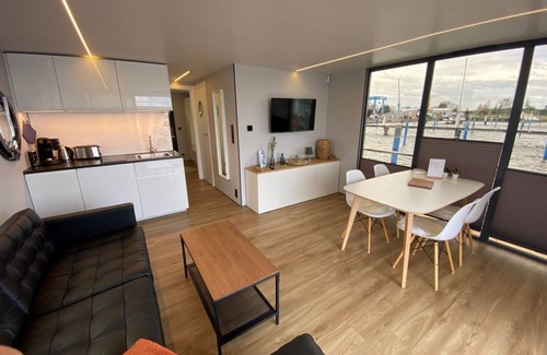 Barth Location De Bateaux | Houseboat Fjord Vineta with bio sauna and roof terrace in Barth