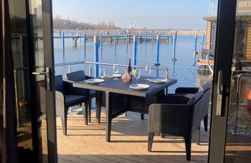 Barth Location De Bateaux | Houseboat Fjord Vineta with bio sauna and roof terrace in Barth