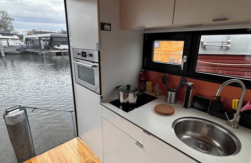 Schmoeckwitz Location De Bateaux | Houseboat with sauna & fireplace - pure relaxation on the water surrounded by nature