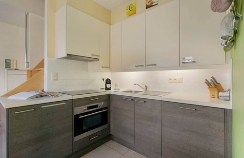 Westende Appartement | Huswell - Sunny duplex apartment near the beach