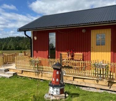 Gislaved Maison | Idyllisk stuga- fri elbilsladdning