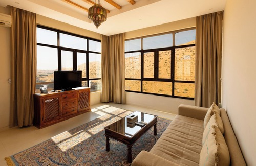 Bidiya Station Balnéaire | Immerse in ultimate desert elegance with the Sand Suite at Thousand Nights Camp