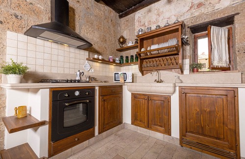 Bagnoregio Maison | In downtown Civita, an aristocratic home for living in time gone by.
