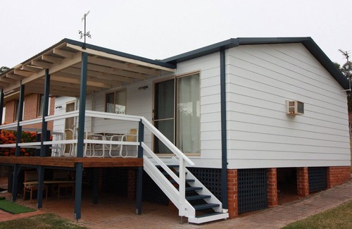 Manyana Maison | «En mode vacances», une maison de vacances de deux chambres dans la banlieue en bord de mer de Manyana pour 4 personnes.