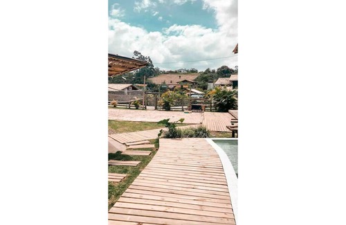 Praia do Rosa Maison | Incredible and cozy Chalet in Praia do Rosa, very close to the beach and city center.