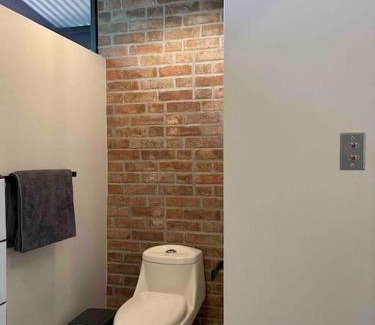 Uvita Appartement | Industrial Studio with private Jacuzzi
