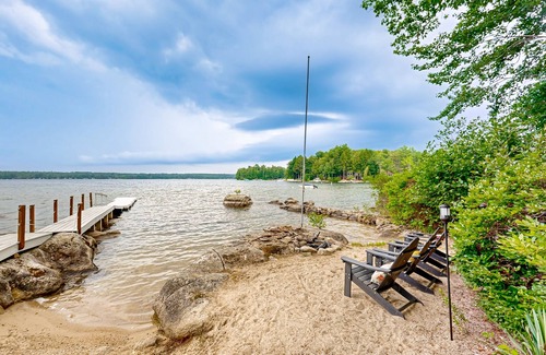 South Casco Maison | Inviting lakefront home with private dock, sandy beach, and stunning views