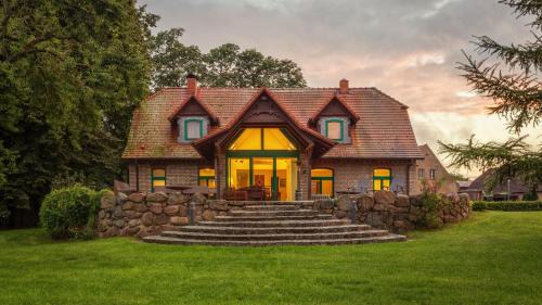 Julchendorf Maison | J1 Idyllisches Ferienhaus mit Seeblick