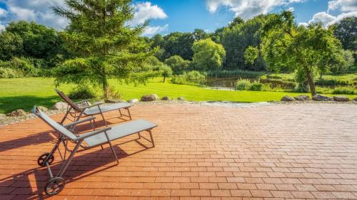 Julchendorf Maison | J1 Idyllisches Ferienhaus mit Seeblick