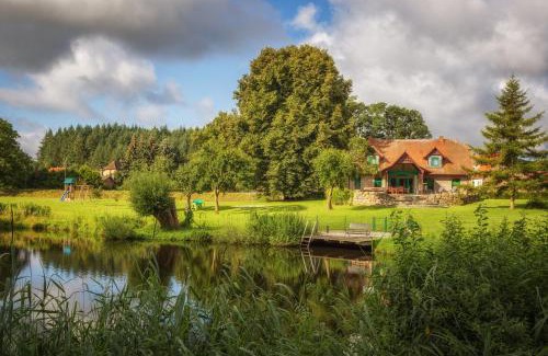 Julchendorf Maison | J1 Idyllisches Ferienhaus mit Seeblick