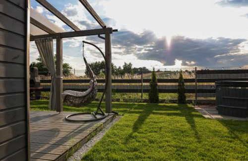 Poniszowice Maison | Jej i Jego - Eleganckie domki z balią na wyłączność