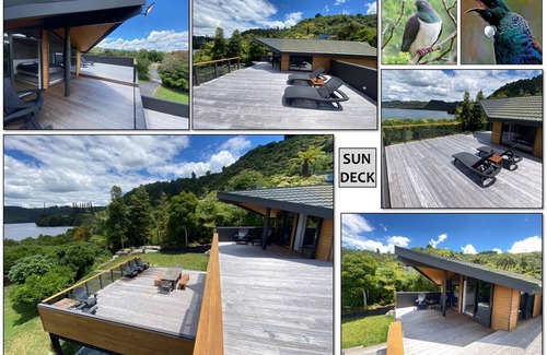 Lake Tarawera Maison | Retraite au bord du lac Tarawera. 5 chambres, 5+ salles de bains. Jetée. Plage.