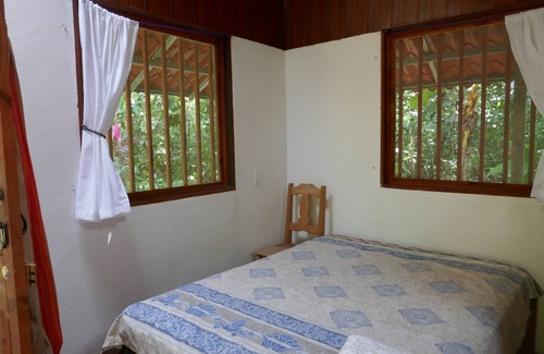 Carate Cabine | Jungle cabin at Playa Lapa, Corcovado sunset, beach, lagoon, kayaks.