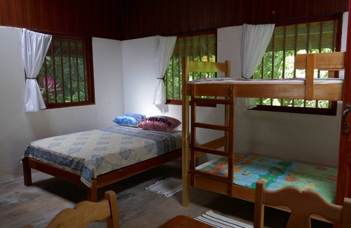 Carate Cabine | Jungle cabin at Playa Lapa, Corcovado sunset, beach, lagoon, kayaks.