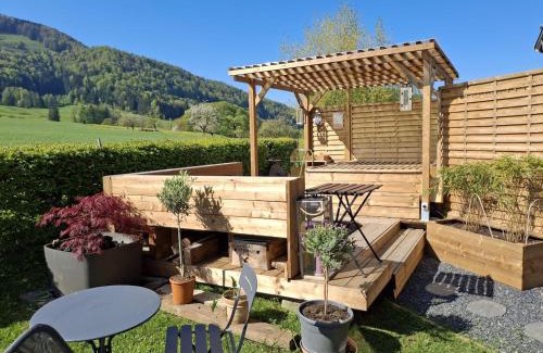 Rebeuvelier Chalet De Ski | Juralodgespa Détente avec jacuzzi et vue