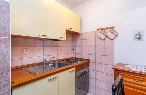 Barbariga Appartement | A seulement 200 mètres de la plage de galets avec vue sur la mer
