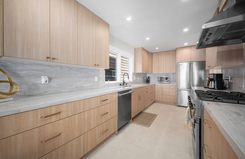Balboa Peninsula Maison | Just Renovated Bay Facing Coastal Home with a Dock