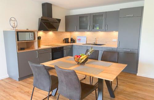 Tossens Appartement | KÜSTE33/20 – Exklusive Ferienwohnung mit Sauna & nah am Strand!