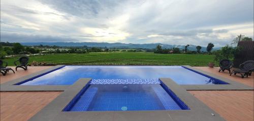 Canloan City Maison | Kalaparan Farm House by HiveRooms