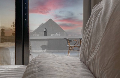 Al Haram Lit Et Petit-Déjeuner | Khan Duidar Inn - Pyramids View Rooftop