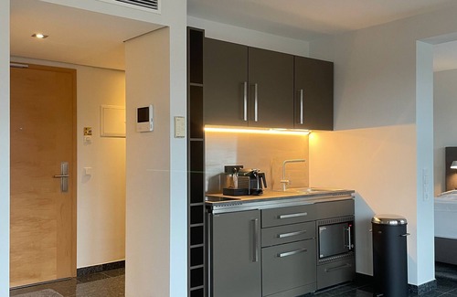 Unterrath Hôtel | King-de Luxe-Apartment-Salle de bain et douche-Balcon