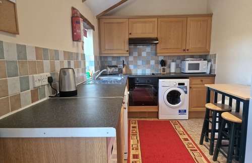 Whitland Cottage | KINGFISHER COTTAGE, pet friendly, avec piscine en Llanboidy, Réf 924587