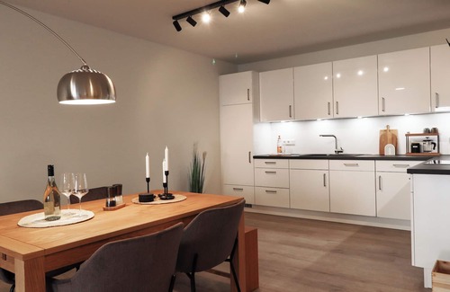 Tossens Appartement | Kojoten33 - pure North Sea feeling. Balcony. Stylish. Close to the beach.