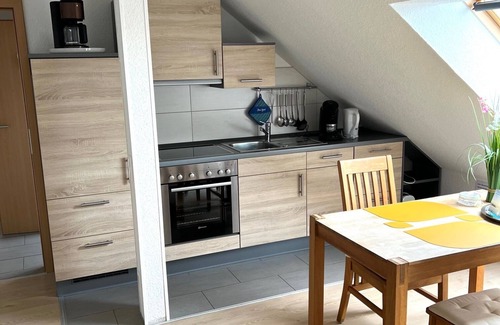 Altenhagen Appartement | Komf. Mod. Apartment with sitting area in the garden near Steinhuder Meer