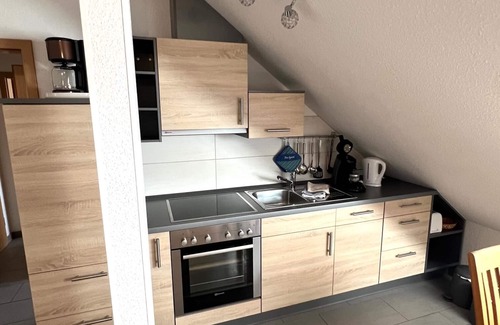 Altenhagen Appartement | Komf. Mod. Apartment with sitting area in the garden near Steinhuder Meer