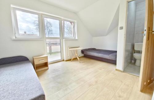 Szczytno Maison | Kompleks domków na Mazurach dla grupy 15 osobowej