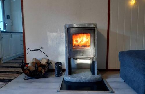 Tretten Maison | Koselig blått hus - utsikt Losna