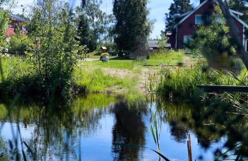 Skien Maison | Koselig hytte langs elven