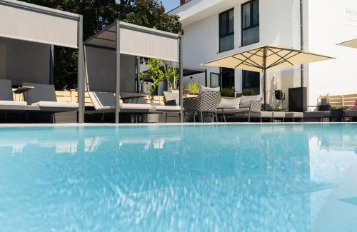 Illmitz Hôtel | Kracher Hotel Doppelzimmer - für maximal 4 Personen inklusive Pool