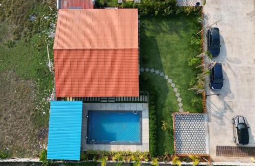 Chevella Chalet De Ski | Kuku farm stay 3 bedroom wooden cottage with private pool at Moinabad