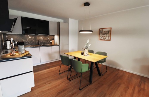 Tossens Appartement | KÜSTE33/13 - North Sea time with style. Sauna. Balcony. Family vacation.