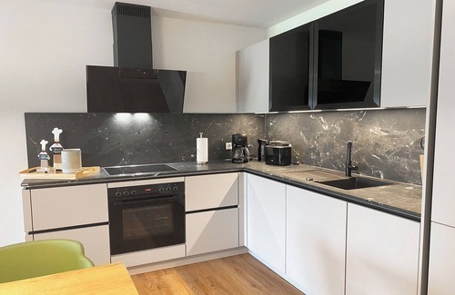 Tossens Appartement | KÜSTE33/13 - North Sea time with style. Sauna. Balcony. Family vacation.
