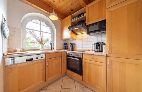 Tannenhausen Maison | Lüttje Huck - Ferienwohnung 3 mit Seeblick & Sauna