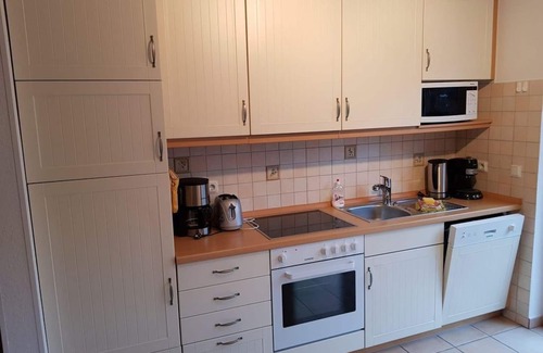 Tossens Appartement | Lüttjes Diekhuus - Ferienwohnung Strandkorb