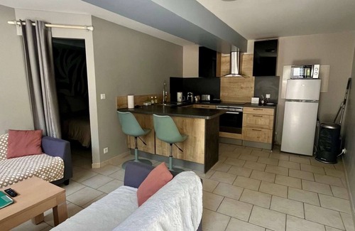 Saint-Come-de-Fresne Appartement | L'Aster, avec accès piscine et jacuzzi