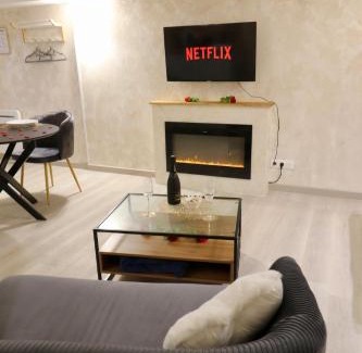 Tournedos-Bois-Hubert Appartement | L'Escapade Enchantée - Spa, Cheminée et Cinéma