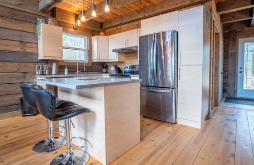 Mauricie Maison | L'Inukshuk | Chalet en bois ave Spa |