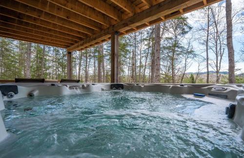 Mauricie Maison | L'Inukshuk - Chalet en bois ave Spa