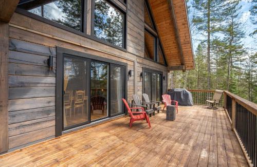 Mauricie Maison | L'Inukshuk - Chalet en bois ave Spa