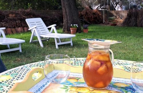 Carbonia Appartement | L'oasi - Monolocale con giardino in Sardegna