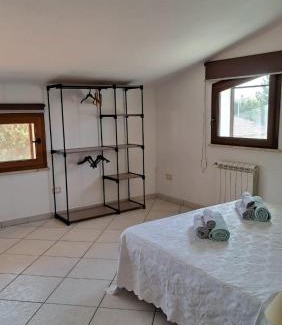 Carbonia Appartement | L'oasi - Monolocale con giardino in Sardegna
